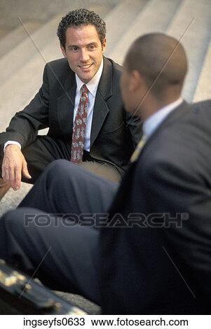 Stock Image - Buisnessmen Talking. Fotosearch