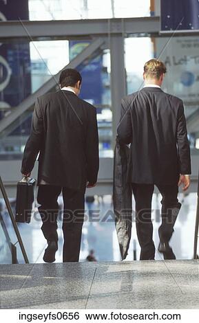 Businessmen Walking Together View Large Photo Image Stock Photograph - Businessmen Walking Together. Fotosearch