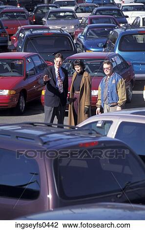 Car Salesman Talking to Couple View Large Photo Image Stock Image - Car Salesman Talking to Couple. Fotosearch