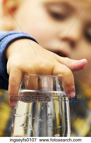 Child With Hand In A Water Glass View Large Photo Image Stock Photo - Child With Hand In A Water Glass. Fotosearch