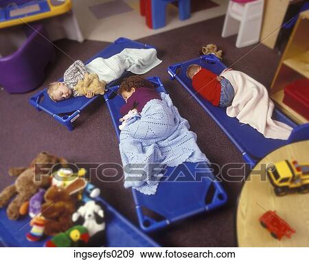 Children Napping On Floor Of Preschool Classroom View Large Photo Image Stock Photo - Children Napping On Floor Of Preschool Classroom. Fotosearch