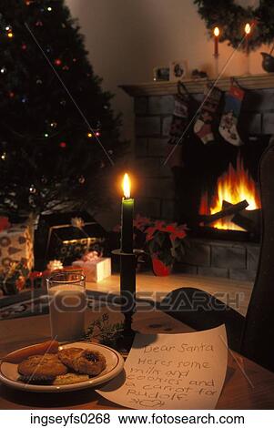 Cookies And Milk Waiting For Santa By Fire View Large Photo Image Stock Photo - Cookies And Milk Waiting For Santa By Fire. Fotosearch
