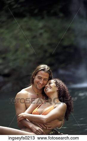 Couple Embracing In Tropical Pool View Large Photo Image Stock Image - Couple Embracing In Tropical Pool. Fotosearch