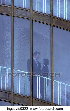 Couple Standing Behind Windows View Large Photo Image Stock Image - Couple Standing Behind Windows. Fotosearch