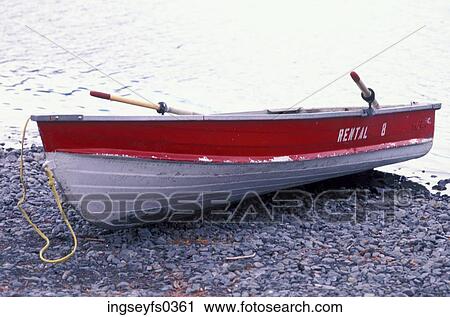 Dingy Resting on Rocky Beach View Large Photo Image Stock Image - Dingy Resting on Rocky Beach. Fotosearch