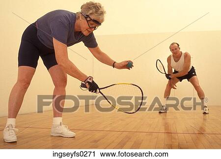 Elderly Couple Playing Racquetball View Large Photo Image Stock Image - Elderly Couple Playing Racquetball. Fotosearch