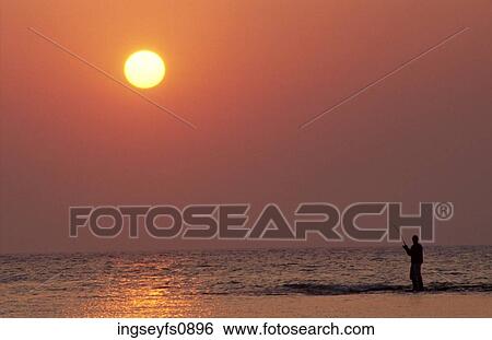 Fishing at Sunset View Large Photo Image Stock Photograph - Fishing at Sunset. Fotosearch