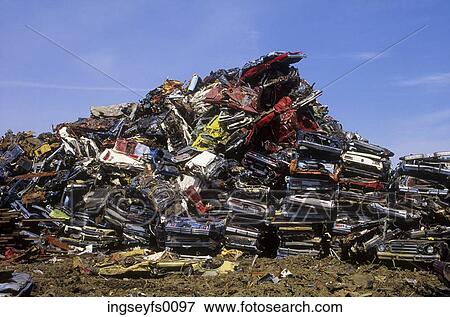 Flattened Cars Piled Up In The Junkyard View Large Photo Image Stock Photo - Flattened Cars Piled Up In The Junkyard. Fotosearch