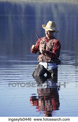 Stock Photograph - Fly Fishing in Trillium Lake. Fotosearch