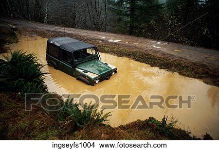 Four Wheel Drive Stuck in Ravine View Large Photo Image Picture - Four Wheel Drive Stuck in Ravine. Fotosearch