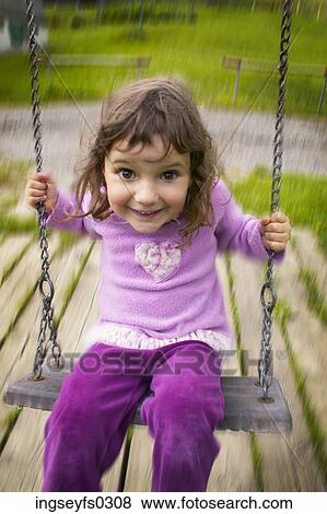Girl Smiling On Swing View Large Photo Image Stock Photo - Girl Smiling On Swing. Fotosearch