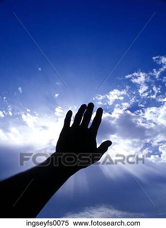 Hand Blocking Out The Sun In A Cloudy Blue Sky View Large Photo Image Stock Photography - Hand Blocking Out The Sun In A Cloudy Blue Sky. Fotosearch