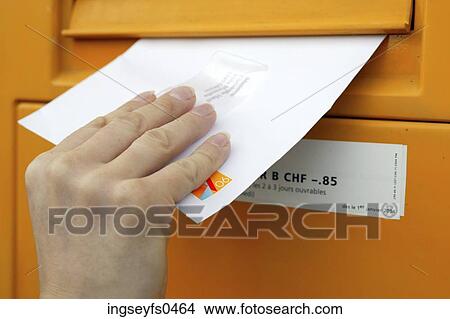Hand Mailing a Letter View Large Photo Image Picture - Hand Mailing a Letter. Fotosearch