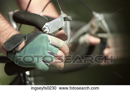 Hands Of Bicyclist Holding Handlebars View Large Photo Image Stock Image - Hands Of Bicyclist Holding Handlebars. Fotosearch