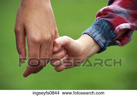 Holding Hands View Large Photo Image Picture - Holding Hands. Fotosearch