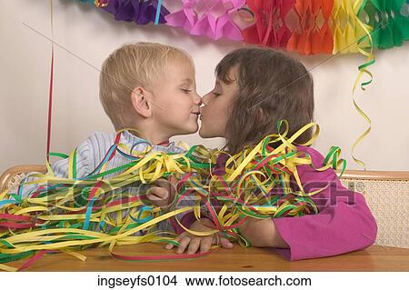 Little Boy And Girl Kissing At A Party View Large Photo Image Picture - Little Boy And Girl Kissing At A Party. Fotosearch