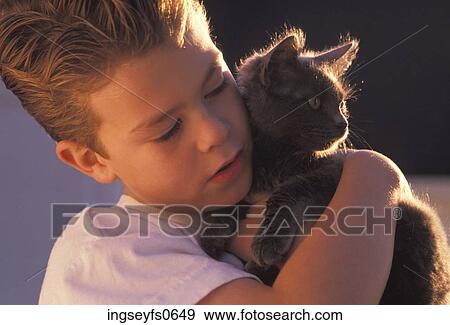 Little Boy Hugging a Kitten View Large Photo Image Stock Photo - Little Boy Hugging a Kitten. Fotosearch