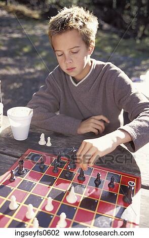 Little Boy Playing Chess View Large Photo Image Stock Image - Little Boy Playing Chess. Fotosearch