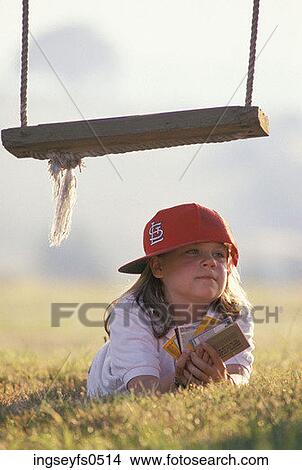 Little Girl Looking at Baseball Cards View Large Photo Image Picture - Little Girl Looking at Baseball Cards. Fotosearch
