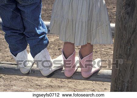 Little Kids' Feet in Cowboy Boots View Large Photo Image Stock Image - Little Kids' Feet in Cowboy Boots. Fotosearch