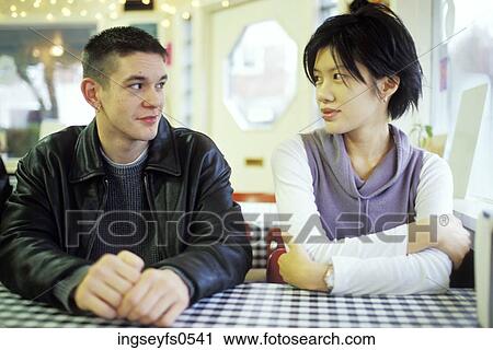 Man and Woman Talking at a Diner View Large Photo Image Stock Image - Man and Woman Talking at a Diner. Fotosearch