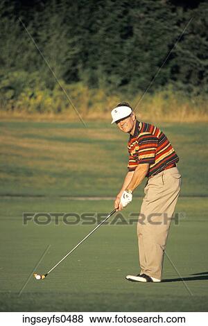 Stock Photo - Man Golfing. Fotosearch