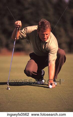 Man Putting on Golf Green View Large Photo Image Stock Image - Man Putting on Golf Green. Fotosearch
