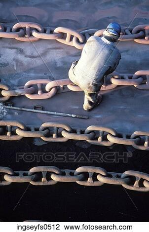 Man Working on Enormous Chains View Large Photo Image Stock Image - Man Working on Enormous Chains. Fotosearch