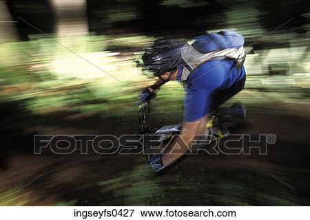 Mountain Biking Through Trees View Large Photo Image Stock Photo - Mountain Biking Through Trees. Fotosearch