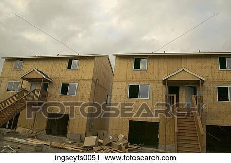 New Homes Being Built On A Cloudy Day View Large Photo Image Stock Image - New Homes Being Built On A Cloudy Day. Fotosearch
