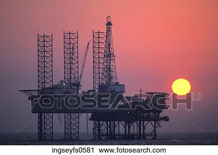 Oil Rig at Sunset View Large Photo Image Stock Image - Oil Rig at Sunset. Fotosearch