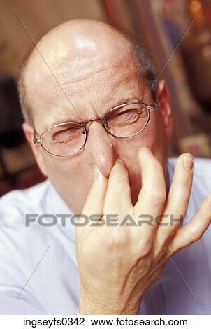 Old Man Pinching His Nose View Large Photo Image Stock Image - Old Man Pinching His Nose. Fotosearch
