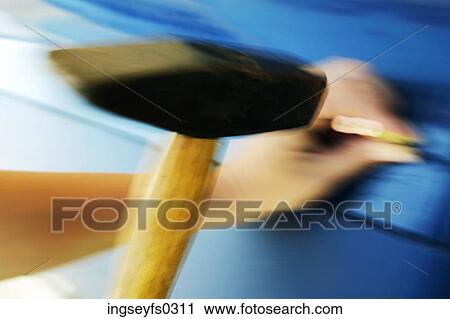 Person Hammering Nail View Large Photo Image Stock Image - Person Hammering Nail. Fotosearch