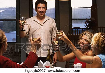 Proposing a Toast View Large Photo Image Stock Photo - Proposing a Toast. Fotosearch