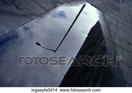 Puddle Reflecting Street Light View Large Photo Image Picture - Puddle Reflecting Street Light. Fotosearch