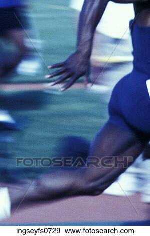 Reaching for the Baton View Large Photo Image Stock Photo - Reaching for the Baton. Fotosearch