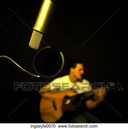 Recording A Guitar Player In The Studio View Large Photo Image Stock Image - Recording A Guitar Player In The Studio. Fotosearch