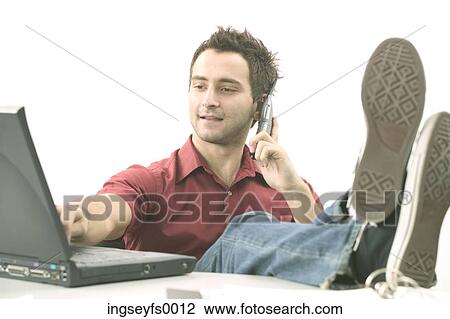 Relaxed Man in Red Shirt with Laptop View Large Photo Image Stock Image - Relaxed Man in Red Shirt with Laptop. Fotosearch