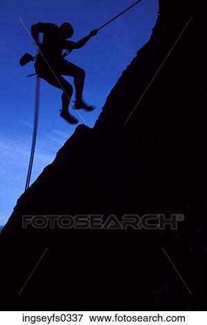Rock Climber Repelling Down Cliff View Large Photo Image Stock Photo - Rock Climber Repelling Down Cliff. Fotosearch