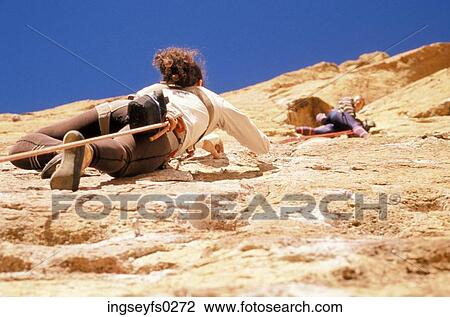 Rock Climbers On Face Of Cliff View Large Photo Image Stock Image - Rock Climbers On Face Of Cliff. Fotosearch