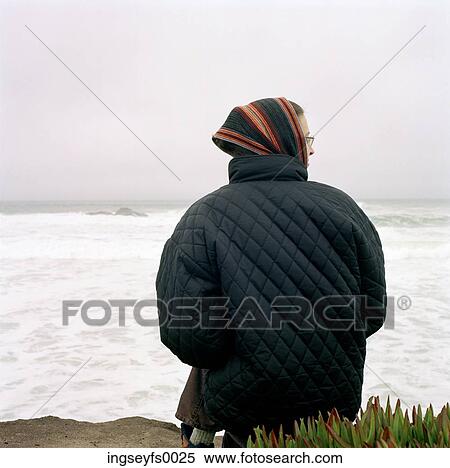 Sitting By The Ocean On A Cold Day View Large Photo Image Stock Photography - Sitting By The Ocean On A Cold Day. Fotosearch