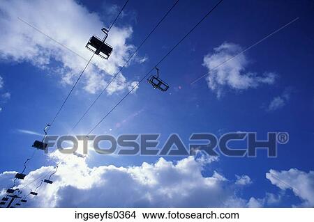 Picture - Ski Lift Against Blue Sky. Fotosearch