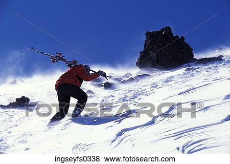 Skier Hiking Up Mountain View Large Photo Image Stock Photo - Skier Hiking Up Mountain. Fotosearch