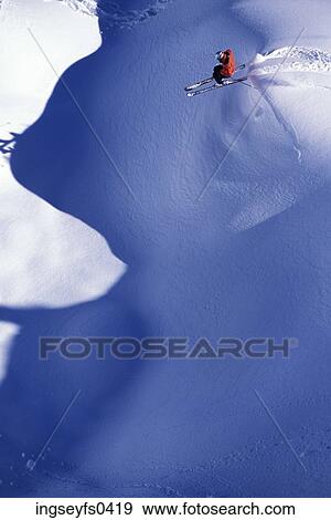 Stock Photo - Skier Over The Top. Fotosearch