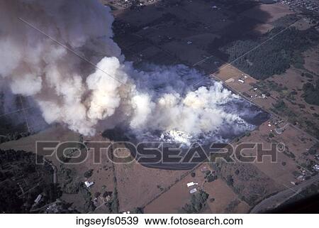 Stock Photo - Smoking Fire Seen from Above. Fotosearch
