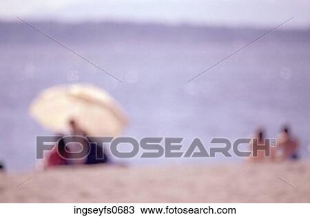 Sunbathing on the Beach View Large Photo Image Stock Image - Sunbathing on the Beach. Fotosearch