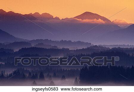 Sunset in Misty Mountains View Large Photo Image Stock Image - Sunset in Misty Mountains. Fotosearch