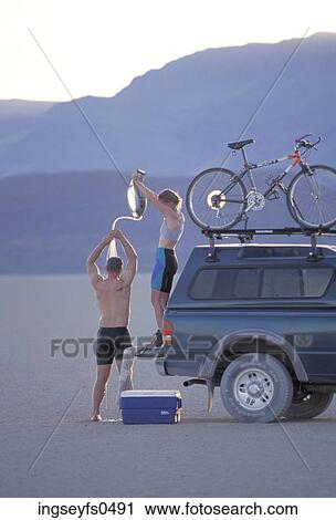Taking a Shower Outside in the Desert View Large Photo Image Stock Image - Taking a Shower Outside in the Desert. Fotosearch