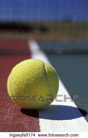 Tennis Ball Resting On The Out-of-Bounds Line View Large Photo Image Picture - Tennis Ball Resting On The Out-of-Bounds Line. Fotosearch