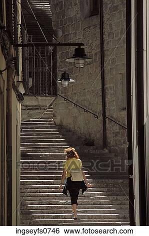 Tourist in Alley View Large Photo Image Stock Photograph - Tourist in Alley. Fotosearch